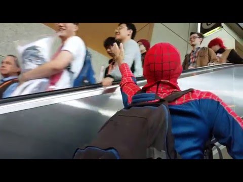 sakuracon spiderman high five up the escalator