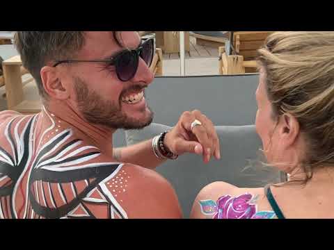 Body painting male model in Cabo. Mowri tattoo body paint. Time lapse video.