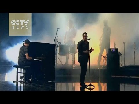 U2 honored at Bambi Awards in Berlin after plane mishap