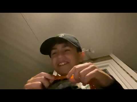 Eating a gummy fire worm 