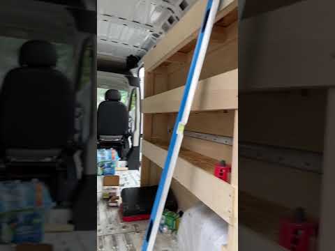 installing shelves into a van