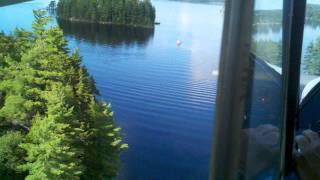 preview picture of video 'Sea plane landing on South Twin Lake'