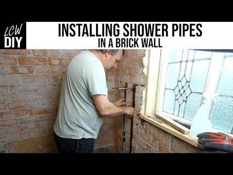 How to Install Shower Pipes in a Brick Wall - Bathroom Renovation 04 - DIY Vlog #19