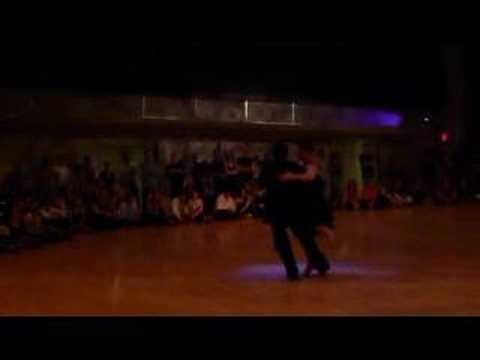  Corina de la Rosa  and  Julio Balmaceda  are  dancing  to  the  tango  "  Amarroto  "