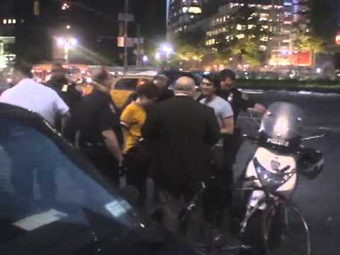 2006 05 Critical Mass - Woman cyclist grabbed while eating her ice cream cone