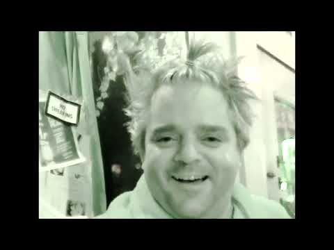 10/14/2005. Ryan Anderson, Chris Kanuch and Corissa perform at the Literary Cafe.