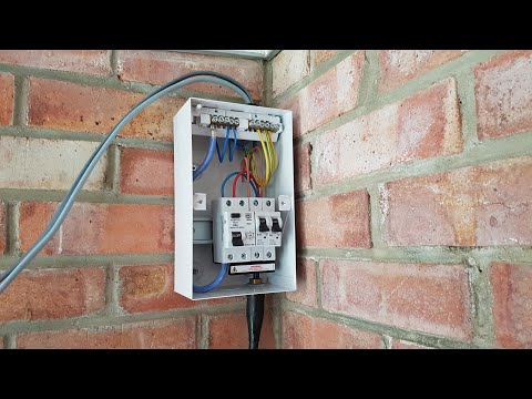 Unboxing and setup of a 4-Way Metal Consumer Unit in a Shed / Garage