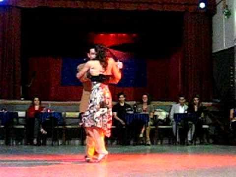  Paola Tacchetti  and  Alejandro Hermida  are  dancing  to  a  vals