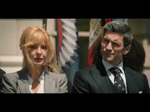 Trailer still of riders cresting a ridge as storm light breaks