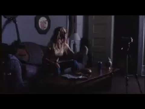 Trailer composition showing characters under sodium-vapor street light—music cues pivot from songs to score