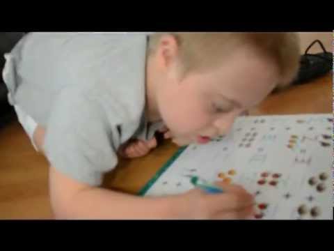 Veure vídeo Down Syndrome doing maths
