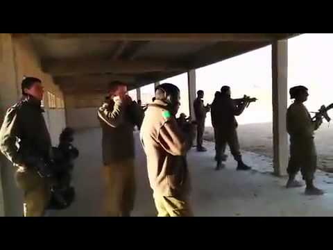 Israeli Soldiers Read Megillah for Purim--with Machine Guns