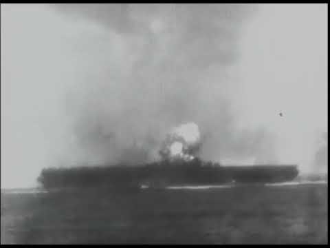 A kamikaze attacking and crashing into USS Essex (CV-9)
