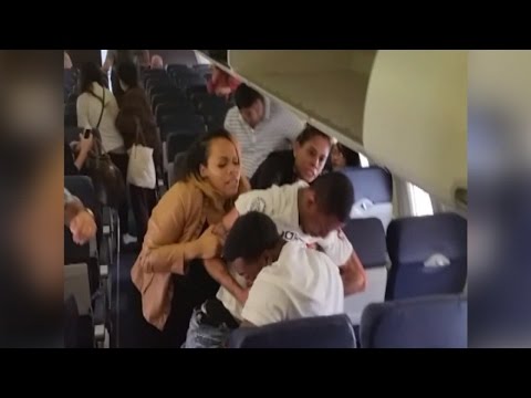 Watch Flight Attendant Get Caught in Middle of Brawl on Southwest Flight