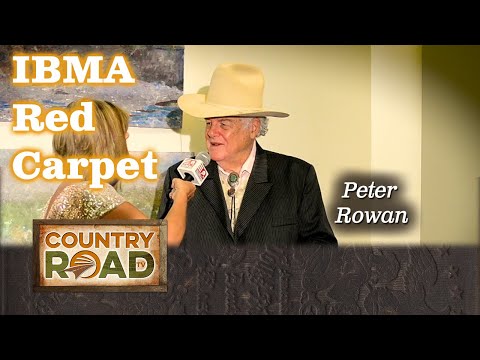 Peter Rowan is inducted into the Hall of Fame.  Country Road TV was there.