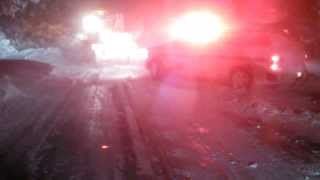 preview picture of video 'Keweenaw County grader pulls out Keweenaw County Sheriff truck'