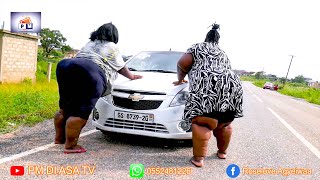 finally PM and her MOM Pushing a car at Accra Mark