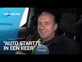 Automobilisten halen auto uit door brand getroffen Singelgarage