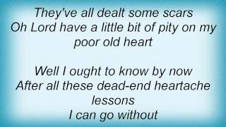 Kenny Chesney - My Poor Old Heart Lyrics