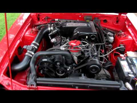 Red Foxbody LX Hatch Mustang