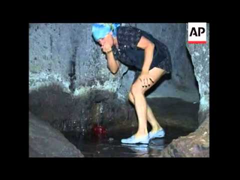 Ancient monastery carved into stone mountains