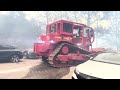 Fire Department Bulldozer Clears Abandoned Cars as Palisades Fire Burns.mp4