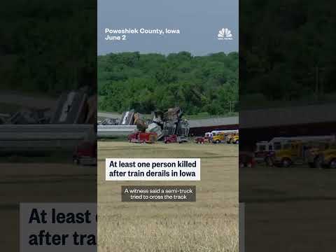 Train derails in Iowa after colliding with tractor-trailer