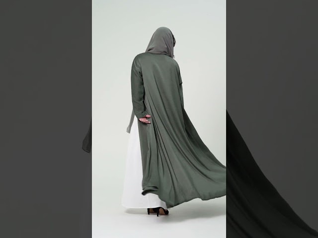 عبايات نسمة زيتي غامق كلوش حرير مغسول من عبايات جدة أربن Jeddah Urban Abayas