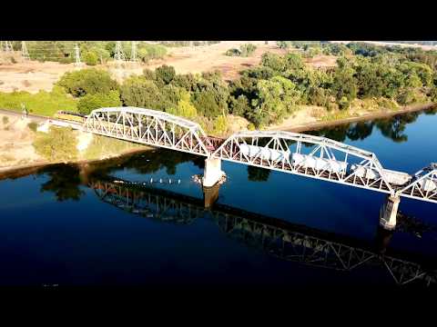 4K: Aerial footage & chase of a BNSF Freight Train over Haggin Junction & the American River Bridge!