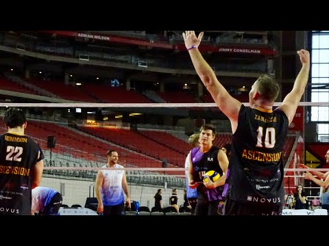 Vince Zanzucchi with the stuff block off the shoulder of Madison Hayden