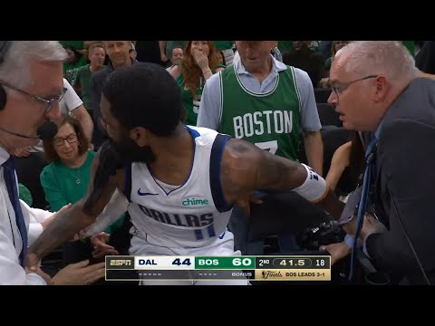 Kyrie Irving gets into it with Celtics fan after diving into crowd "f**k is wrong with you"