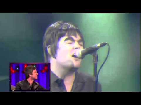 Alan Carr singing Some Might Say by Oasis on TOTP