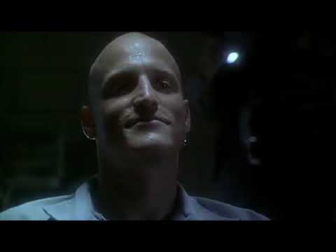 Natural Born Killers montage shot of TV screens and riot footage