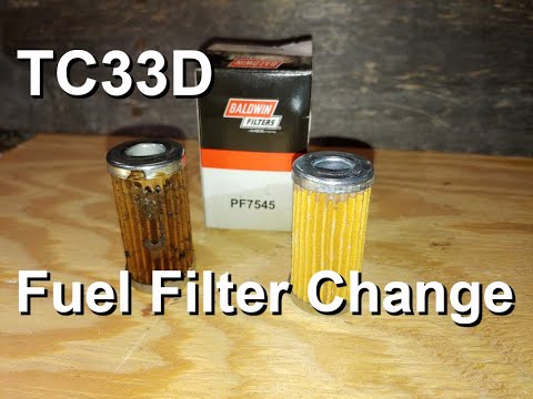 New Holland TC33D | Changing the Fuel Filter and Bleeding the Fuel Lines
