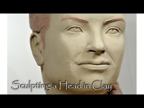Sculpting a head in clay