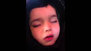 E boy chewing gum while asleep.