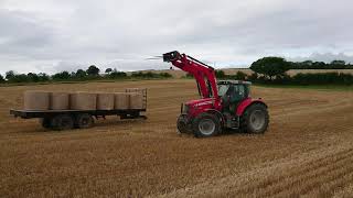 Loading Round Bales onto a trailer