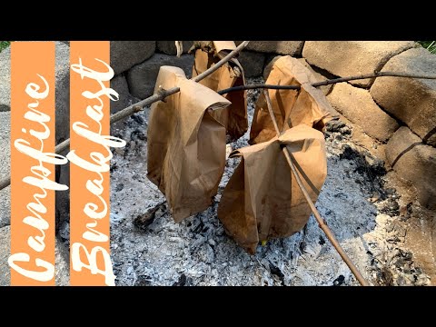 Eggs And Bacon Cooked In Brown Bag Over The Campfire