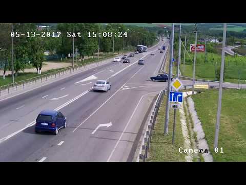 A car cuts the road of a cyclist in Russia