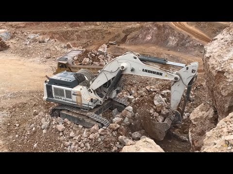 Liebherr 984 Excavator Loading Caterpillar Dumpers - Sotiriadis Brothers