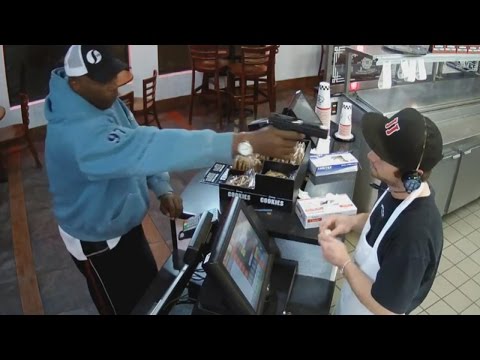 Watch Unfazed Cashier Keep His Cool During Terrifying Gunpoint Robbery