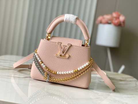 Louis Vuitton Capucines East-West Why Knot Taurillon Leather Handbag