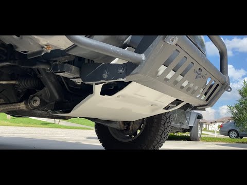 Tacoma TRD Skid Plate fits with a brush guard installed