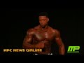 2018 IFBB Pittsburgh Pro Men's Physique Winner Raymont Edmonds Posing On Stage