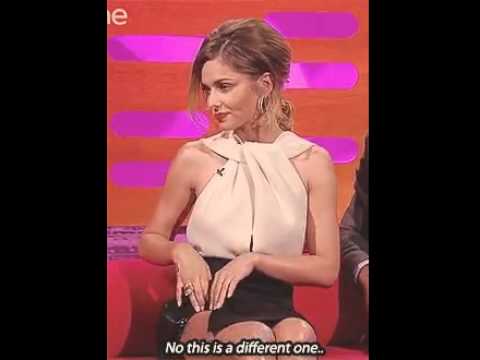 Cheryl shows of her barbed wire tattoo!