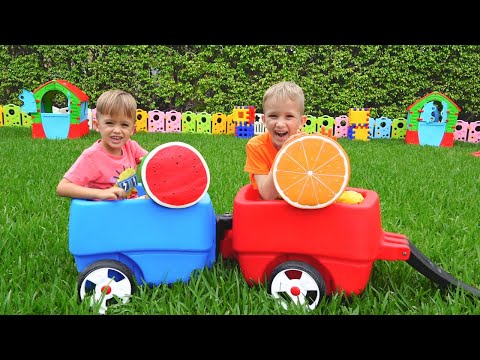 Vlad i Nikita bawią się z mamą na farmie