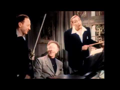 interesting scene. Heifetz Piatigorsky Rubinstein. AI Colorize.