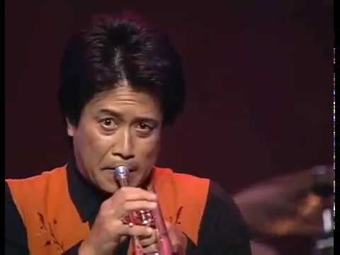 Tiger Okoshi (of Tiger's Baku)  playing with Jazz Fusion Band UZEB