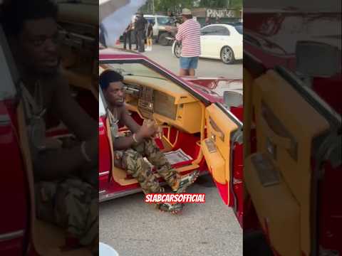 Thumbnail for KODAK BLACK VIDEO SHOOT (RARE FOOTAGE) #swangas #kodakblack #slab #cars #slabcarsofficial by Kodak
