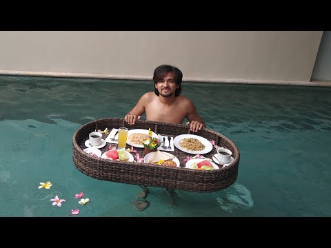 Floating Breakfast at Private Pool Villa Kayu Raja in Bali, Indonesia